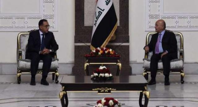 الرئيس العراقى يستقبل مصطفى مدبولى